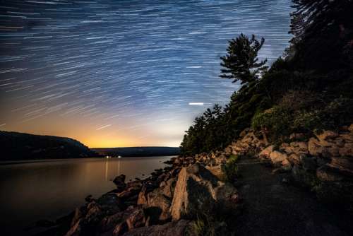 night sky star trails landscape rocks