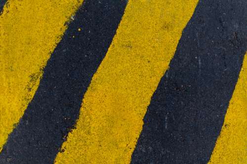 yellow black lines asphalt road