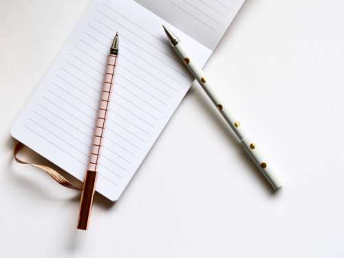 notepad pink pens minimal white