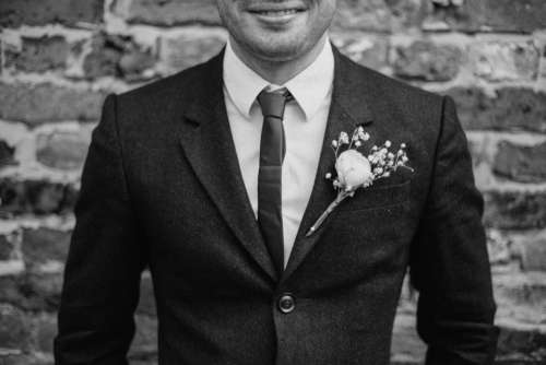 groom close-up suit black & white wedding