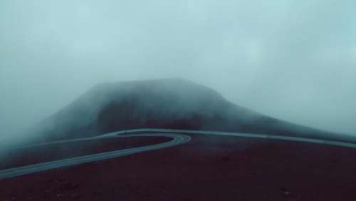 mountain highland fog sky landscape