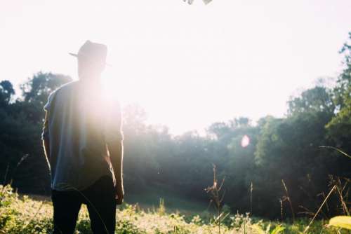 sunshine sun rays guy man hat