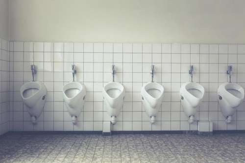 urinals bathroom restroom washroom tiles