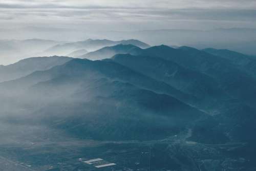 landscape mountains valleys hills clouds