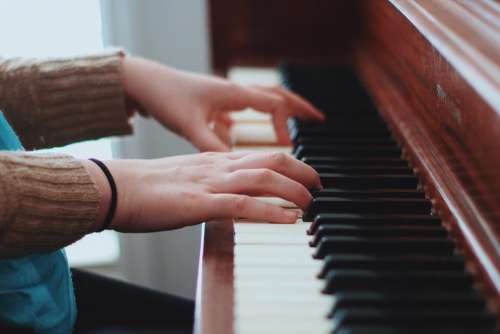people hands piano instrument music