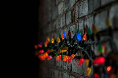 dark wall colorful lights wire