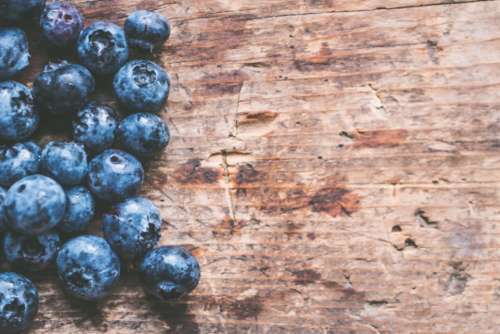 blueberries fruit table wood food