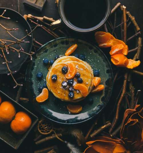 pancake orange fruit blueberry presentation