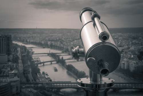 telescope view city river bridge