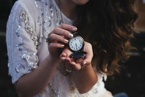 people woman time clock watch