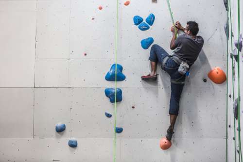 indoors rock climbing person man