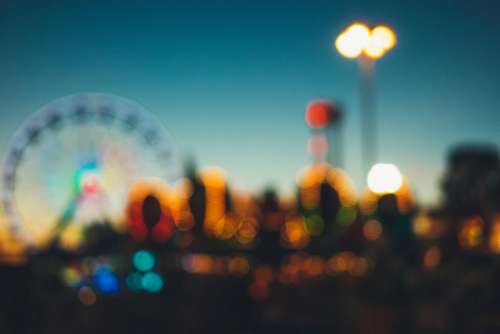 amusement park fair rides fun blurry