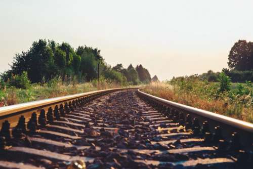 train tracks railroad railway transportation rocks