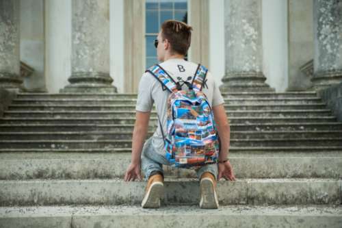 boy travel backpack male person