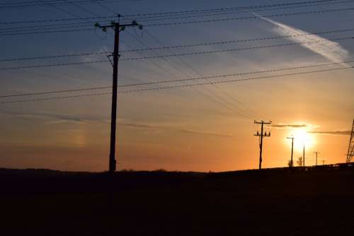 sunset powerlines wales silhouette