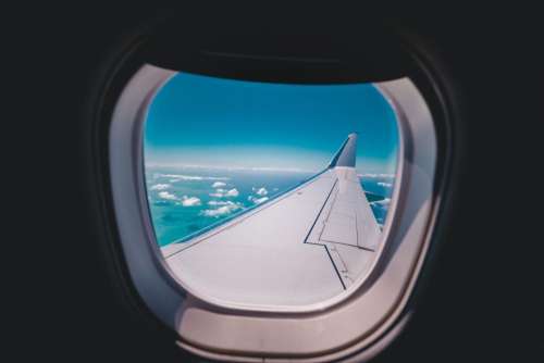 airplane travel adventure plane window