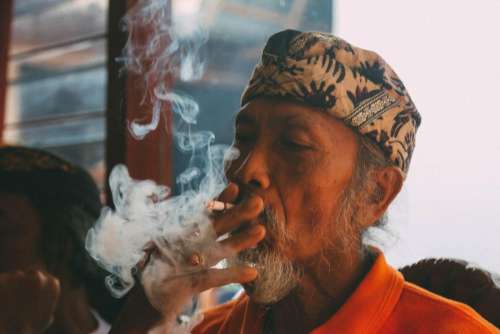 people old man smoking cigarette