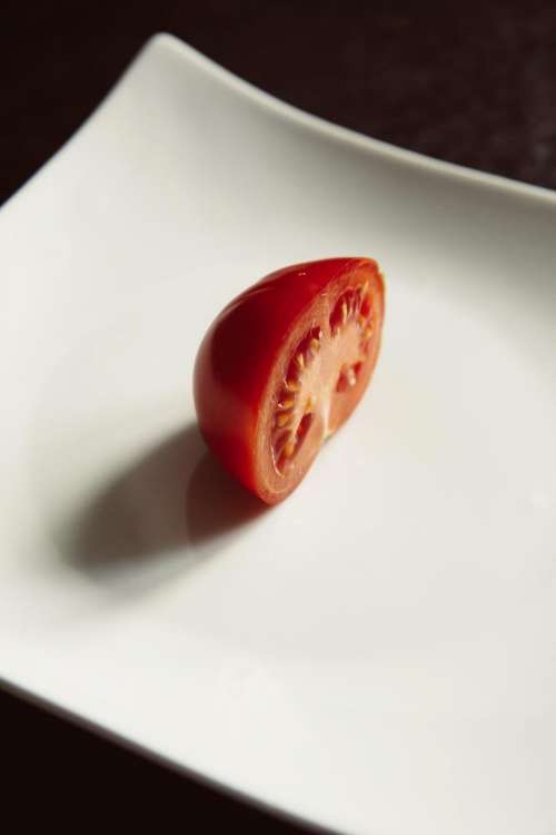 white plate red tomato food