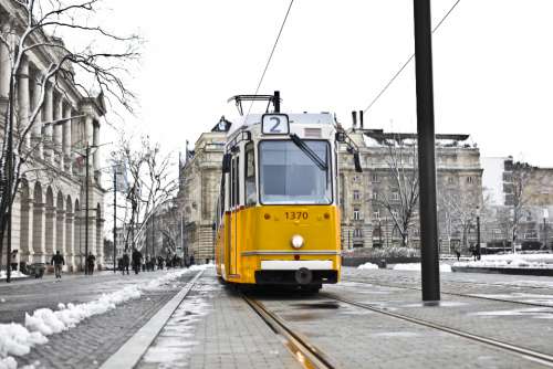 yellow city tram cold snow