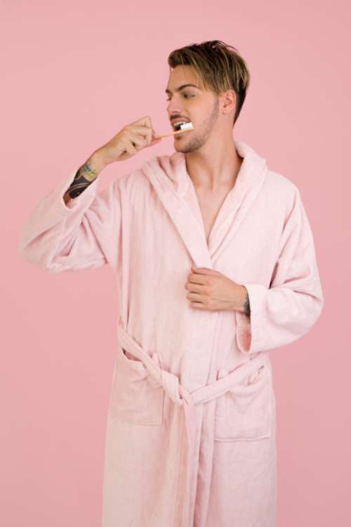 bathrobe morning brushing teeth man male