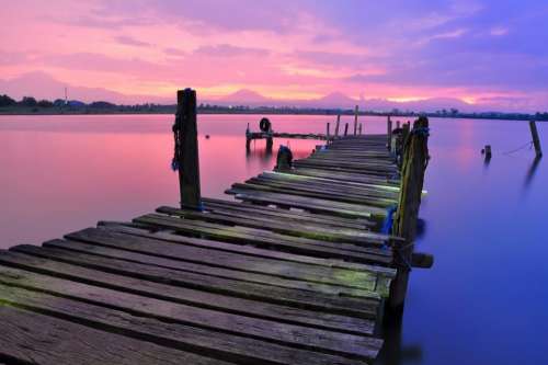 dock pier lake water purple