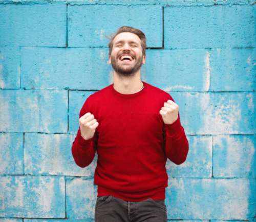 man celebrating smile happy beard