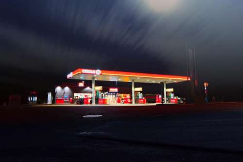 dark night filling gas station