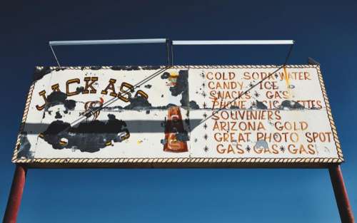 sign board signage blue sky