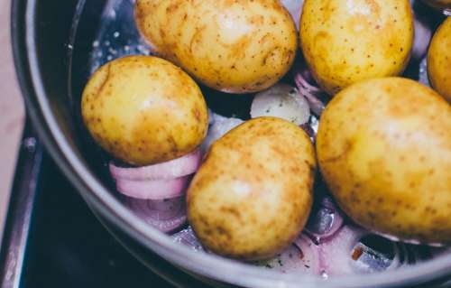 potatoes onions pot stove cooking