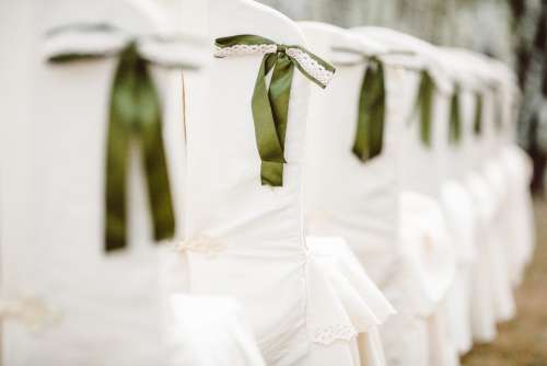 wedding chairs wedding ceremony bows white