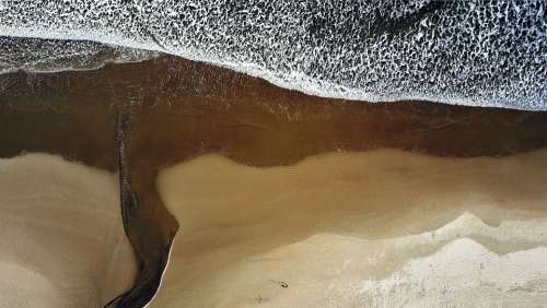 aerial beach sand ocean sea