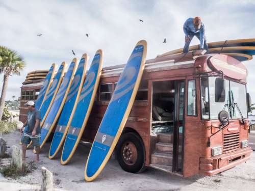 surfboard stacked bus sport sea