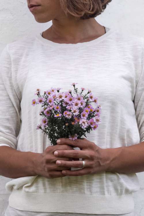 woman holding flowers bouquet spring