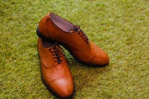 brown shoe footwear leather green
