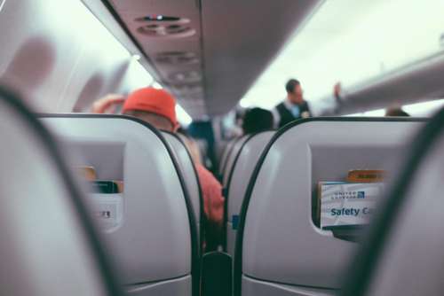 inside airplane airline travel trip