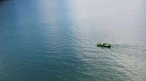 boat rowing lake ocean water