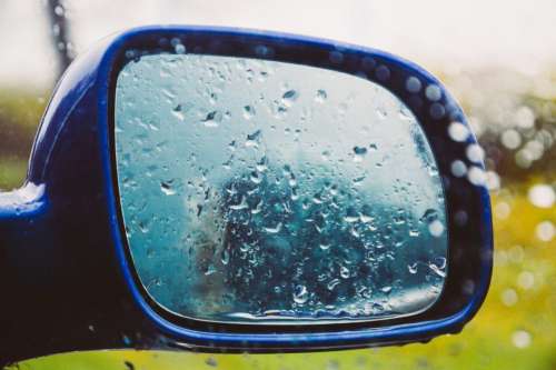 mirror window raining wet rain drops
