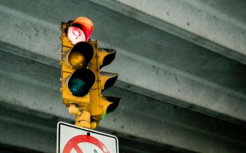 sign stoplight green yellow city