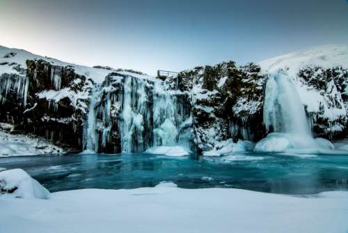 frozen waterfalls iceland winter snow