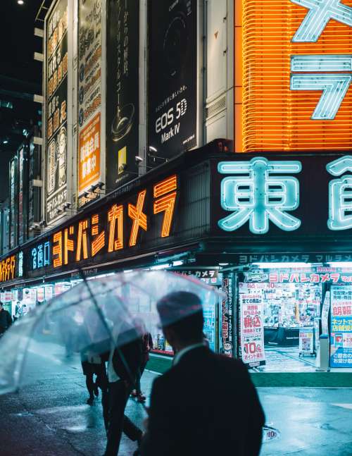 neon tokyo street signs people