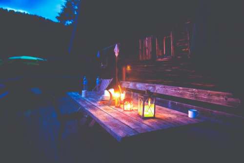picnic table deck backyard outdoors night