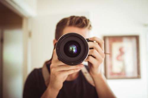 camera lens photographer photography people