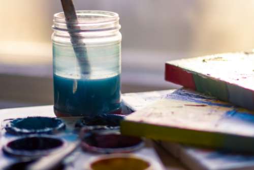 clean paint brush blue glass