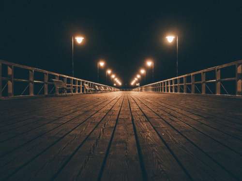 wood boardwalk pier dock night