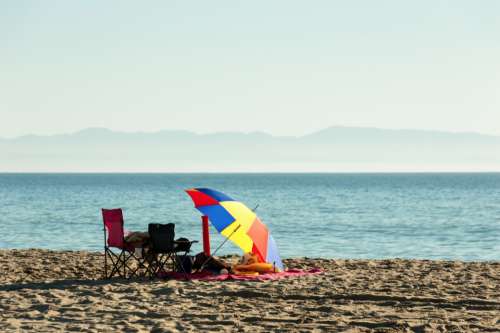 lakeside beach umbrella colorful seat
