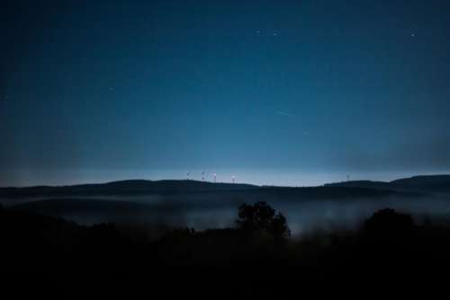 highland mountain night blue sky