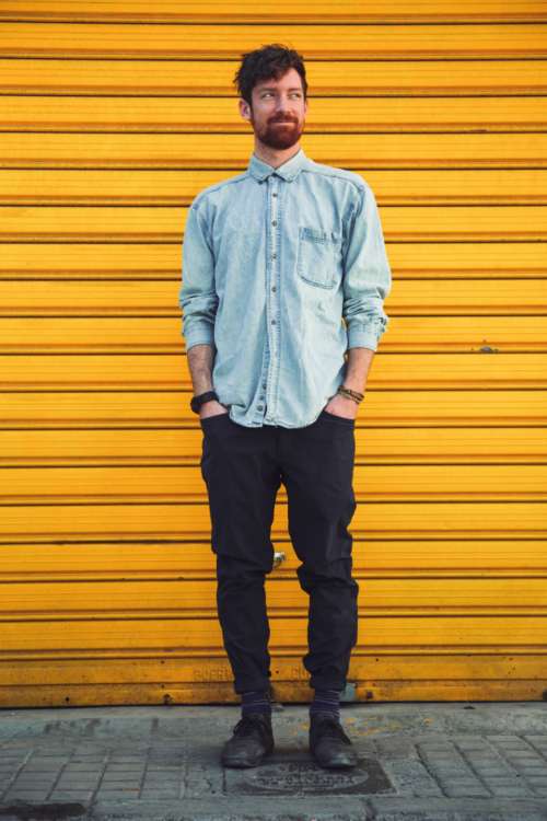 man smiling hipster pockets fashion