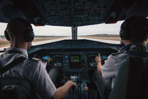 cockpit pilot people men airplane