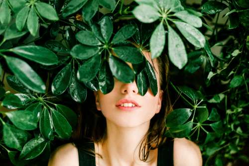 hiding woman plants nature people