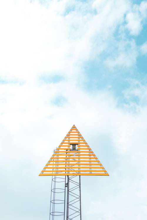 triangular tower camera blue sky
